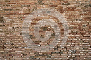 Wall background of bricks with different shades and worn by the passage of time. Concept background, wallpaper, copy space,