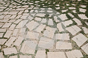 Wall background with yellow natural sandstone tiles