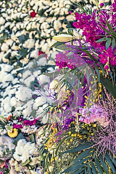 Wall and bouquet of handmade natural flowers for celebration