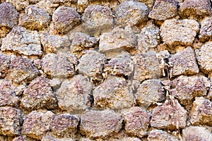 wall of brick, tuff and stone.
