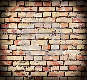 A wall of bricks in a house under construction as an abstract background
