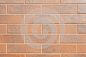 Wall of brown plates brick