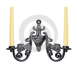 Wall candlestick in vintage style with two candles, isolated on a white ackground