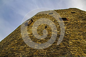 Wall of a castle with blue sky