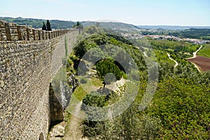 Wall of Castle of Obidos in Portugal pheasant fields