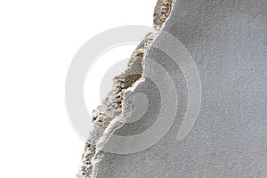 The wall of a cement house that was smashed isolate on white background