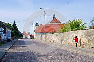 Wall and church in Tykocin, Poland