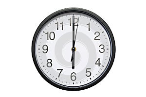 Wall clock shows time 6 o`clock on white isolated background. Round wall clock - front view. Eighteen o`clock