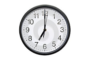 Wall clock shows time 7 o`clock on white isolated background. Round wall clock - front view. Nineteen o`clock