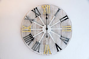 Wall clock on white wall . nine o clock