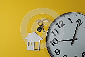 wall clock on a yellow