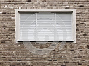 Closed window with rolling shutters or roller blinds