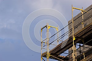 Wall of concrete building. Construction site works.