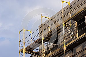 Wall of concrete building. Construction site works.