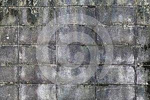 The wall of concrete tiles decorative bricks. textural composition