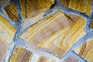 Wall of concreted stones