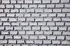 Wall covered with a decorative brick