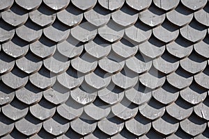 The wall covered with wooden shingles - wooden background horizontal