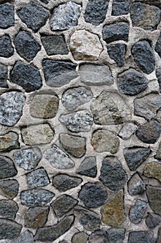 Wall with dark gray gravel pebbledash texture