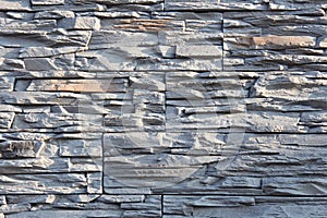 Wall of decorative stone in gray