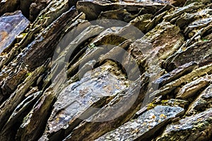 Wall of different colorful stones