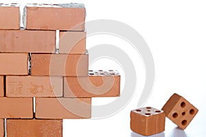 Wall with different red bricks on white background