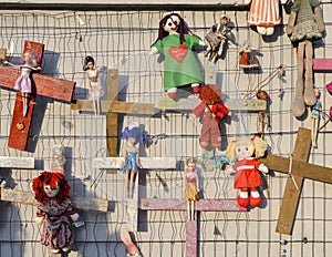 Wall of Dolls protest in Navigli district protesting against female physical and sexual violence, throughout the world