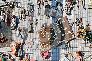 Wall of Dolls protest in Navigli district protesting against female physical and sexual violence, throughout the world