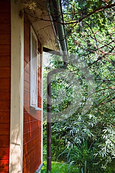 Wall and drainpipe of new country cottage