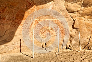 Wall in the Elands Bay cave with rock art