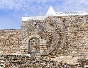 The wall and the entrance gate in Monsaraz town, Ãâ°vora District, Portugal