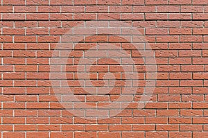 Wall from an equal red brick, background, texture series