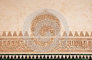 The wall with etail of islamic calligraphy