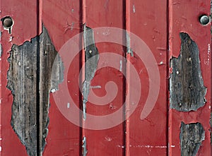 Wall with flaking red paint