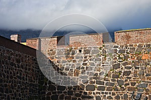 Wall of the fortress with cannons