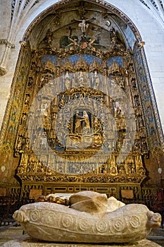 Wall with gold sculptures with Easter themes in the Cathedral of Burgos. photo