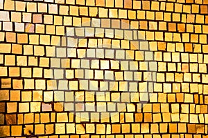 Wall with golden mosaic as texture