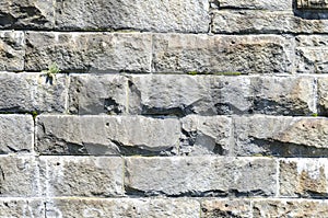 Wall of granite brick