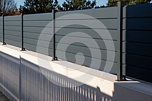 wall grey aluminum barrier and gray fence of private individual house modern new protect view home garden