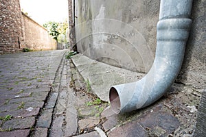 An rain drain from the roof