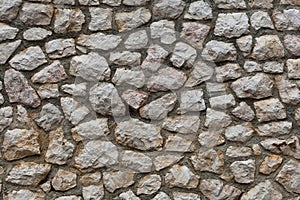 Wall of hewn natural stone