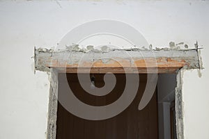 wall with a hole for a door at a constriction site, lintel