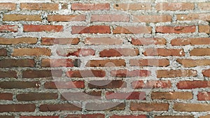 the wall of a house made of red bricks, panoramic view of a red brick wall