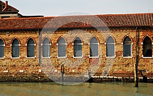 Wall illuminated by the sun in Murano in Venice Lagoon in Italy