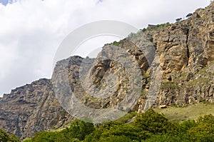 wall of impregnable stone mountains in the Caucasus