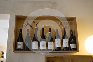 Wall installation with bottles and goblets