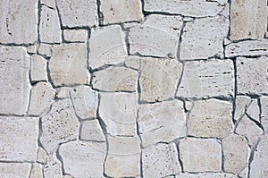 Wall lined with limestone slabs