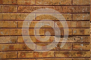 Wall made of bricks on store building facade at Merida