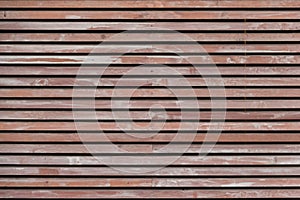 Wall made of brown wooden slats