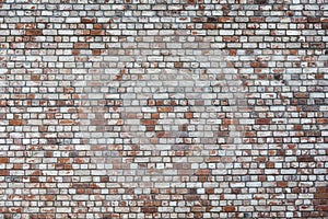 The wall is made of old bricks, background.